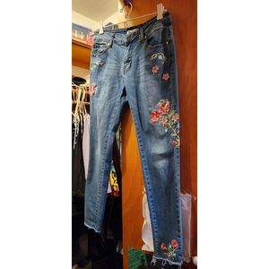 EUC floral embroidered skinny jeans